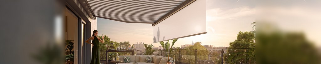 A modern terrace with a large retractable awning and a woman standing, framed by greenery and a sunset.